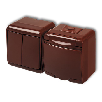 KARLIK JUNIOR 4WGHH-2p Łącznik świecznikowy z gniazdem pojedynczym z uziemieniem 2P+Z (klapka brązowa; przesłony torów prądowych)